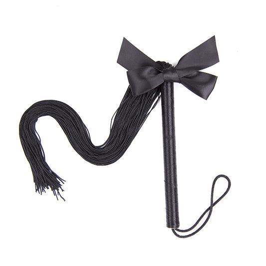Misfit Faux Leather Bow Flogger