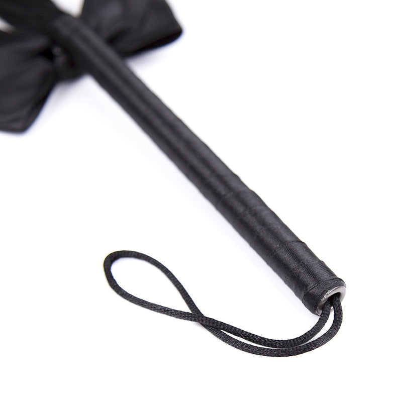Misfit Faux Leather Bow Flogger
