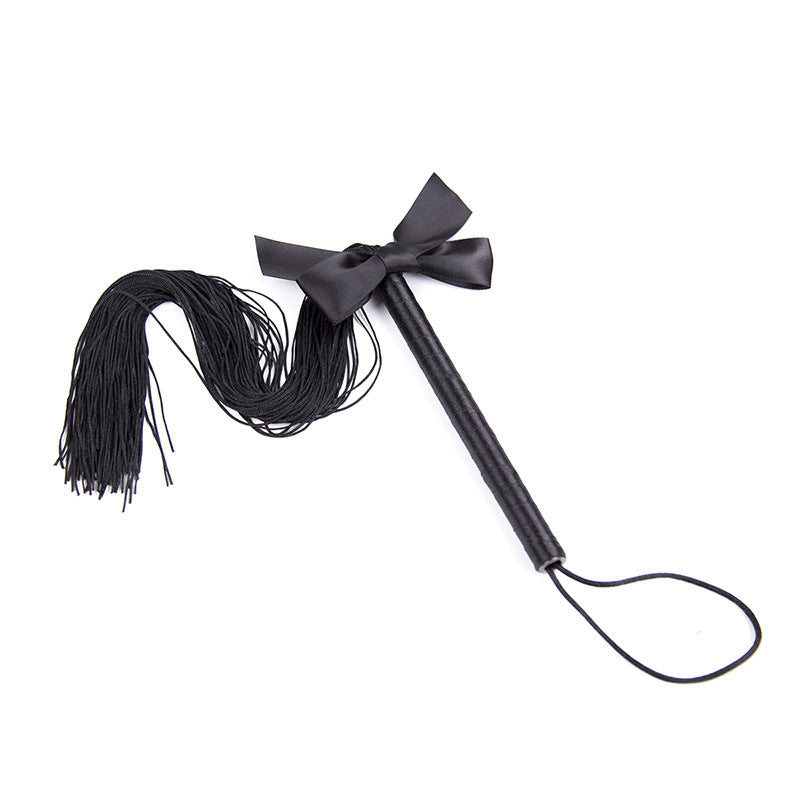 Misfit Faux Leather Bow Flogger