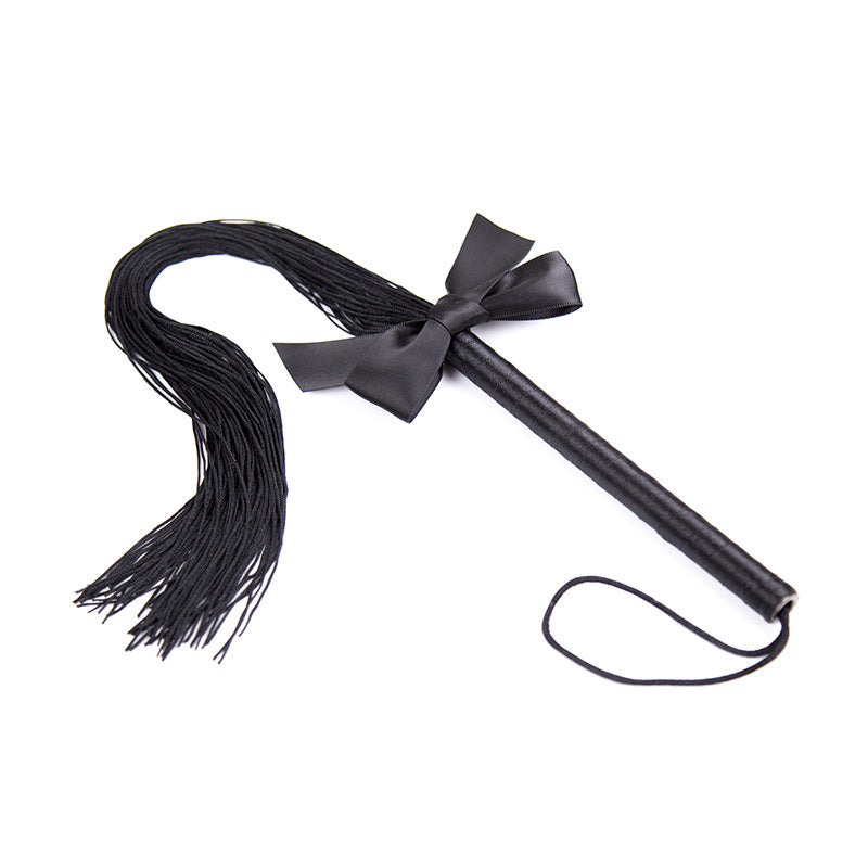 Misfit Faux Leather Bow Flogger